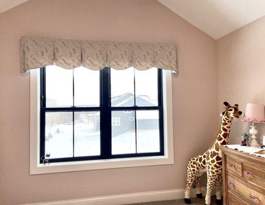 Valance with scalloped bottom to finish a girl's bedroom in a Woodbury home