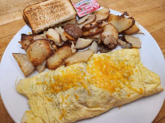 Omelet breakfast with fresh baby red American fries