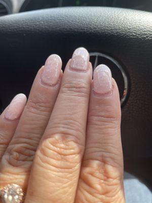 Messy and lumpy gel manicure