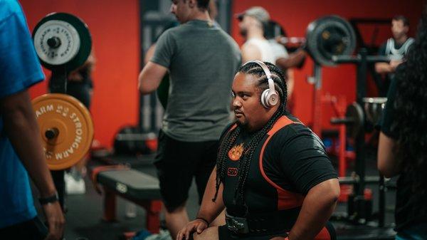 Athlete prepping during powerlifting meet