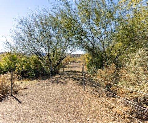 Accessible nature trail. Length - about 1/2 mile that passes the pond, pollinator gardens, Agua Fria River and Interpretive signs.