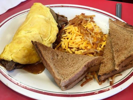 Prime Rib Omelette with cheesy Hash Browns