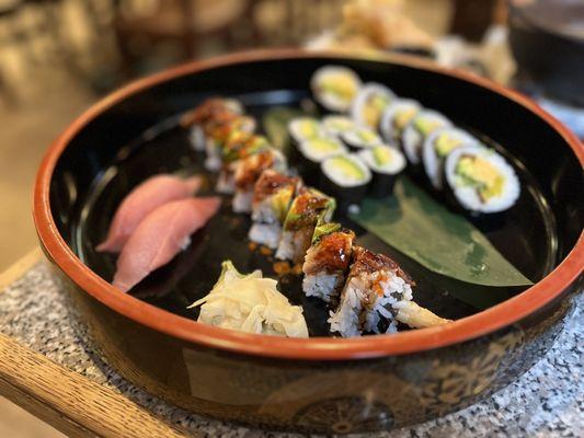 Maguro nigiri, dragon roll, avocado roll and futomaki