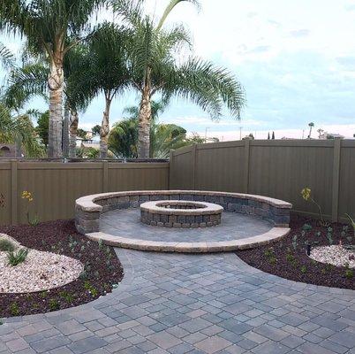 Love love love our firepit area surrounded with plants