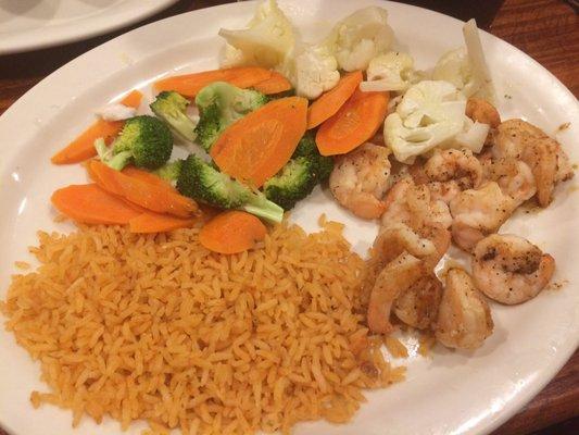 Grilled shrimp, steamed vegetables, and rice for $8.75. Really tasty.