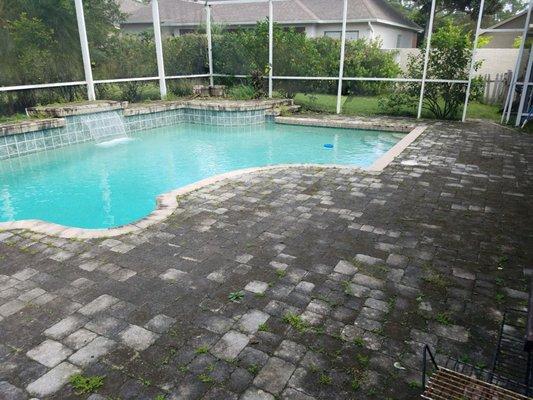 Pool deck before pressure washing.