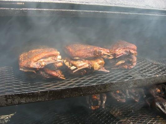 Tex's pork spare ribs and chickens on the smoker.