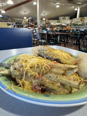 Pueblo Slopper with smothered fries.