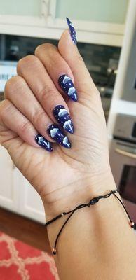 This is a photo of her latest art work on my nails. She is so creative, I don't think there is anything I can't bring to her.