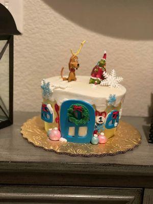 Our sons first birthday cake. We went with a grinch theme, and Bethany knocked it out of the park!