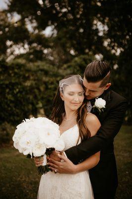 Bridal bouquet with garden roses, orchids.  photo from Avonne Photography.