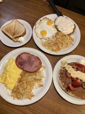 Beery banana pancakes Sunnyside eggs Slices of Toast