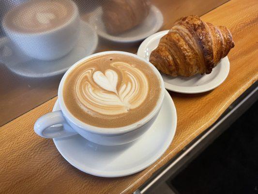 Latte and a croissant. What can I say, I am a basic man with expensive needs