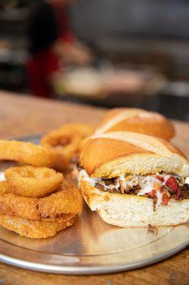 Pete's Philly served with a side of Onion Rings