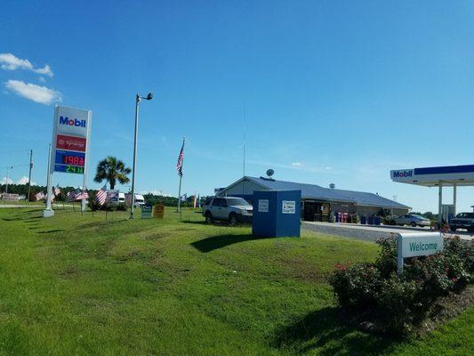 Located in the building at the Mobil gas station on the east side of 95.