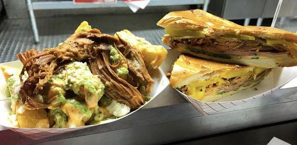 Loaded yucca fries and the signature Cubanh Mi