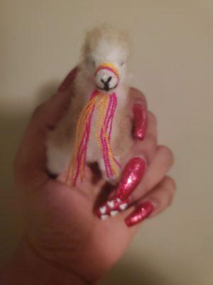 My nails along with a Llama that my son gifted me for my birthday.   are perrrfeccttt