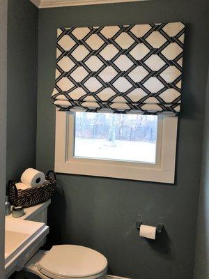 This Roman shade finishes off this powder room perfectly!