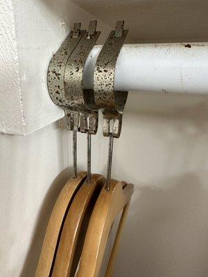 Rusted hangers to hang clothes...til!