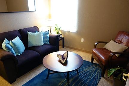 Comfortable couples and family therapy room.