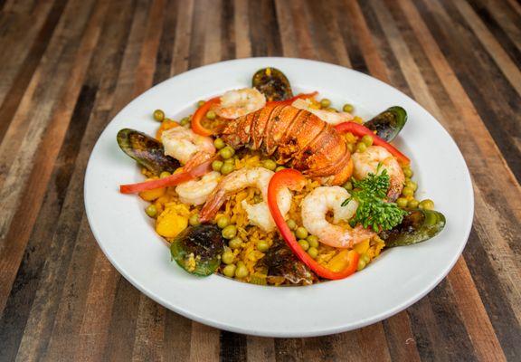 paellas spanish style  rice made from sccratch with shrimp ,lobster tail and seafood mix