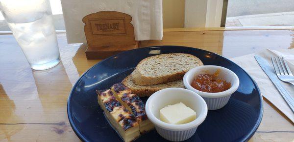 "Squeaky" cheese Finnish soft cheese pressedand toasted, rye toast and cloudberry preserves