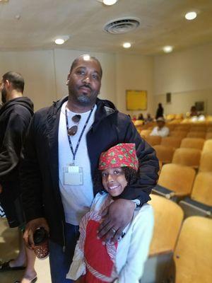 My son and granddaughter after a school play