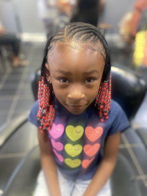 Kids Creative Braids with Beads and hair added to the ends.