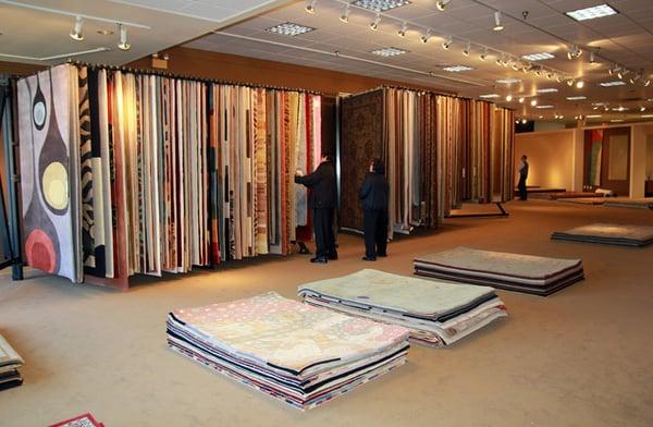 Selection of 6'x9' rugs.