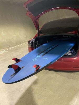 Quatro Glide Max 8'10" will fit in a model 3 with front passenger seat down and reclined all the way