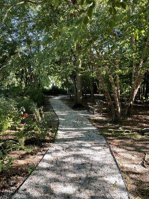 Gravel path to small gardens