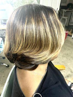 Precision haircutting with highlights on a weave