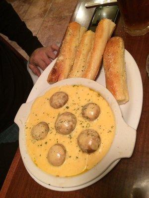 Mushrooms and bread sticks, perfect combination between the smothered mushrooms and crisp breadsticks