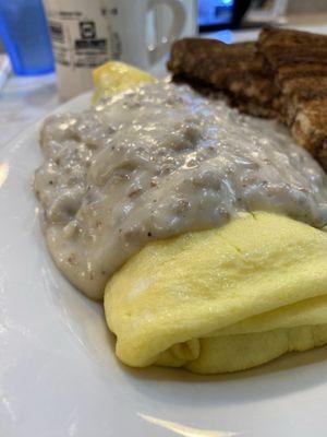 Smothered Omelette $9.99 Sausage and cheddar inside and topped with sausage gravy  *Homefries sold separately