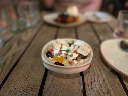 Panna cotta  with fruit and dried meringue bits.  This was truly amazing.