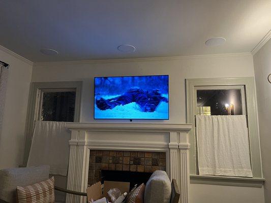 Ceiling speakers and tv on the wall