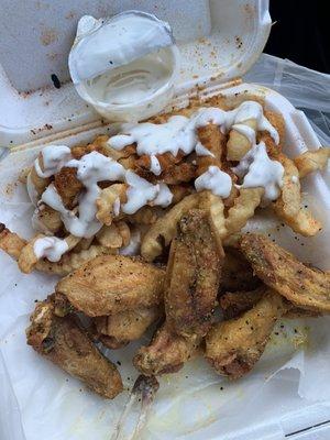 10 Piece Wings, lemon pepper and Cajun fries