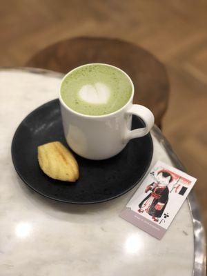 Rose lavender matcha latte ($6.53 incl tax) with a free madeleine, loyalty punch card on the side (9th drink free)