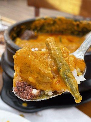 A perfect scoop of Kare Kare, rice, veggies and bagoong!