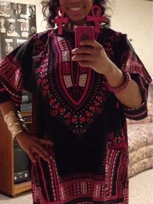 The dashiki, the fuchsia Ankh earrings, the silver arm cuff & the pink bracelet on the other arm - all came from Falla's.