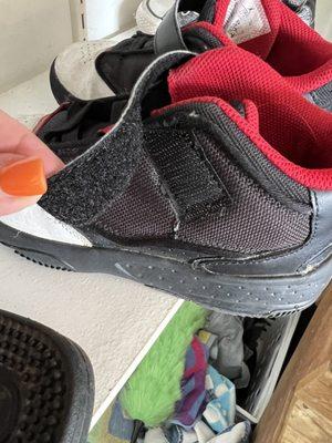 New Velcro stitched onto Nike shoes by the Village Cobbler Shoe Repair.