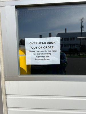 Sign on overhead door