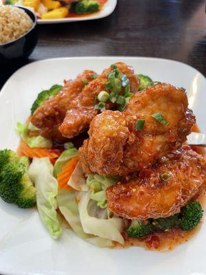 Volcano Chicken with Veggies. Fried rice on the side. Plate is 12" square.