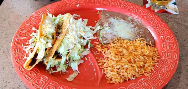 Two Shredded Beef Tacos Dorado Combination Plate