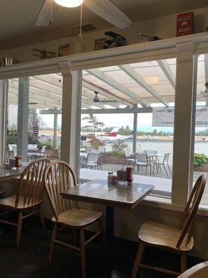 Great view of airplanes from inside seating.