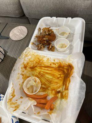 My girl's demolished "Honey Love (Spicy)" whole wings.