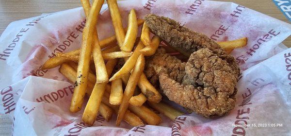 My overdone chicken strips and dry fries.