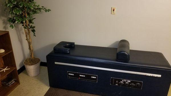 Patients enjoy lying down on the therapy table before or after their adjustments.