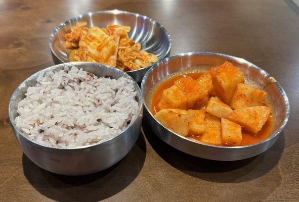 Rice for your soup and free sides of cabbage and radish kimchi