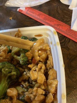 Chicken and broccoli with tiny bits of chicken. It's almost like they saved all these little chicken scraps and threw them in to my meal